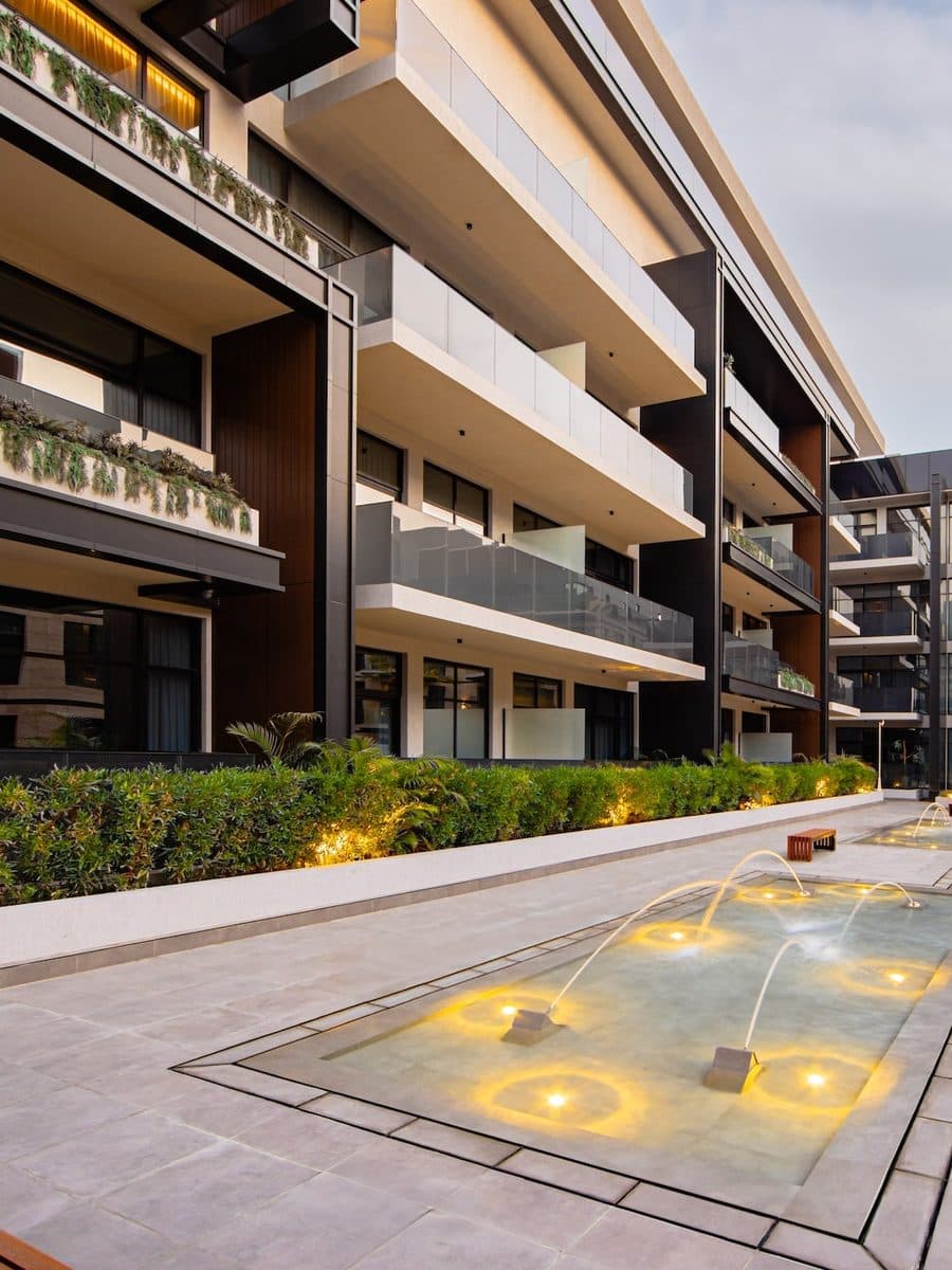 M77 Residences at dusk